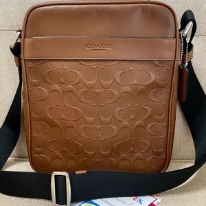 COACH Charles Flight Bag in Signature Leather (Nickel/Saddle)